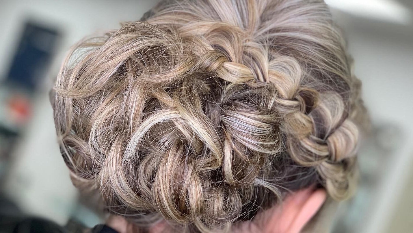 Intricate braided updo hairstyle by Thistles by Bethany Danielle Hair in Carlisle, England, GB.