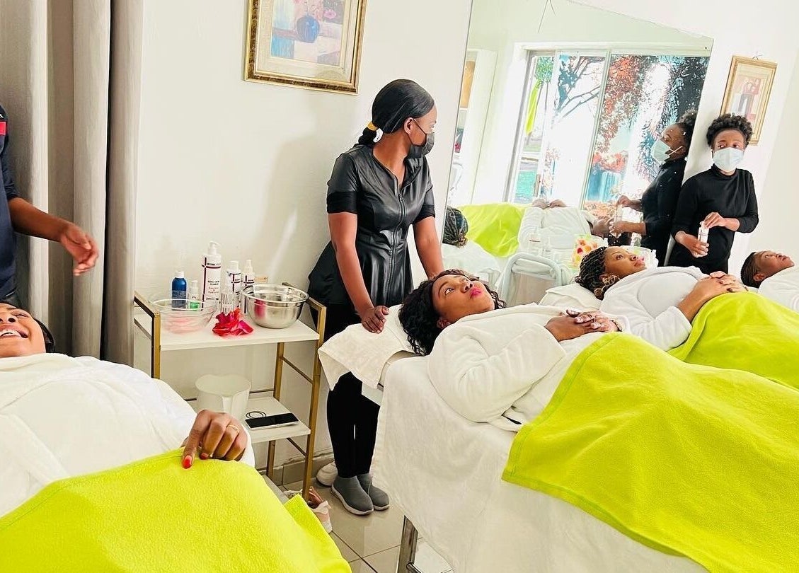 Clients enjoying pampering treatments at IHB Salon n Spa in Midrand, Gauteng, ZA with serene ambiance.