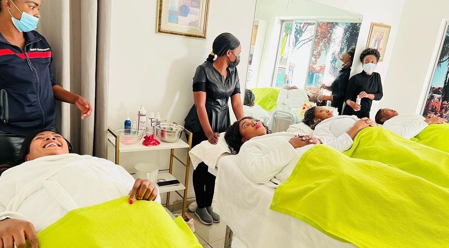 Clients enjoying pampering treatments at IHB Salon n Spa in Midrand, Gauteng, ZA with serene ambiance.