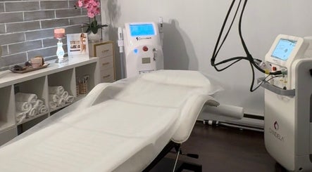 Calm treatment room at BC Queens Clinic, Burnaby, British Columbia, CA with modern equipment and decor.