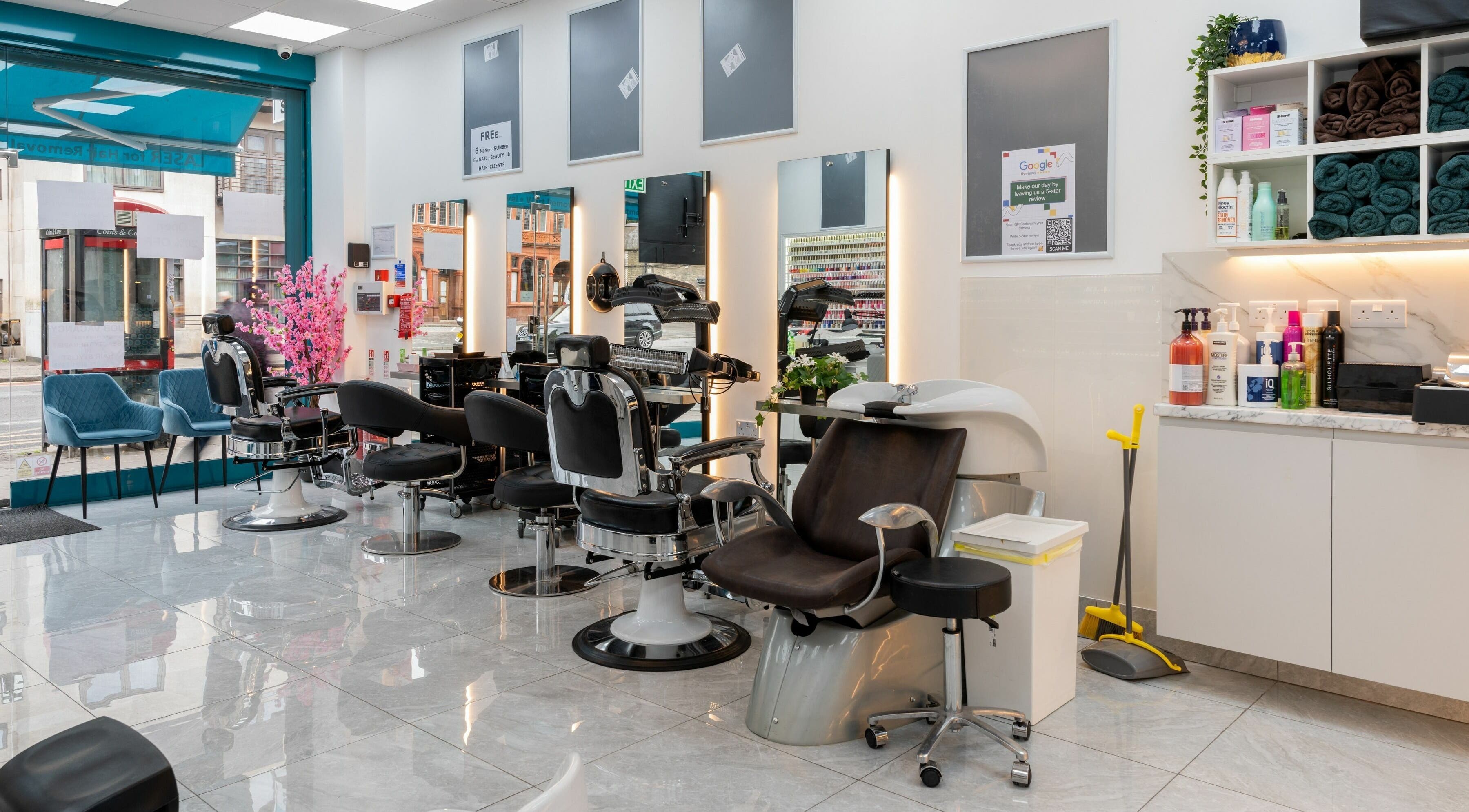 Modern salon interior at Lemoge Clinic - Cricklewood Broadway, London, England, GB, featuring stylish chairs and decor.