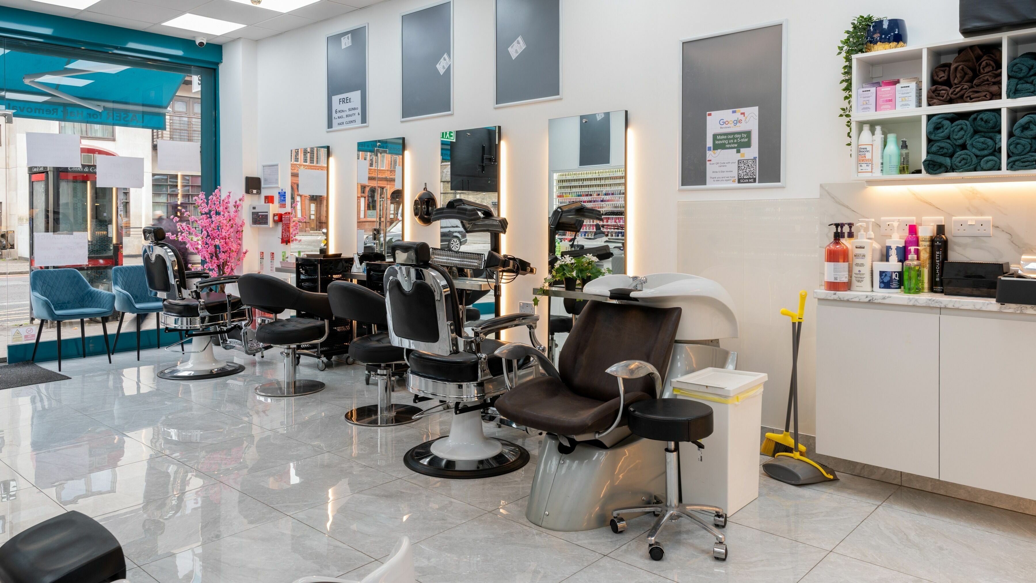 Modern salon interior at Lemoge Clinic - Cricklewood Broadway, London, England, GB, featuring stylish chairs and decor.