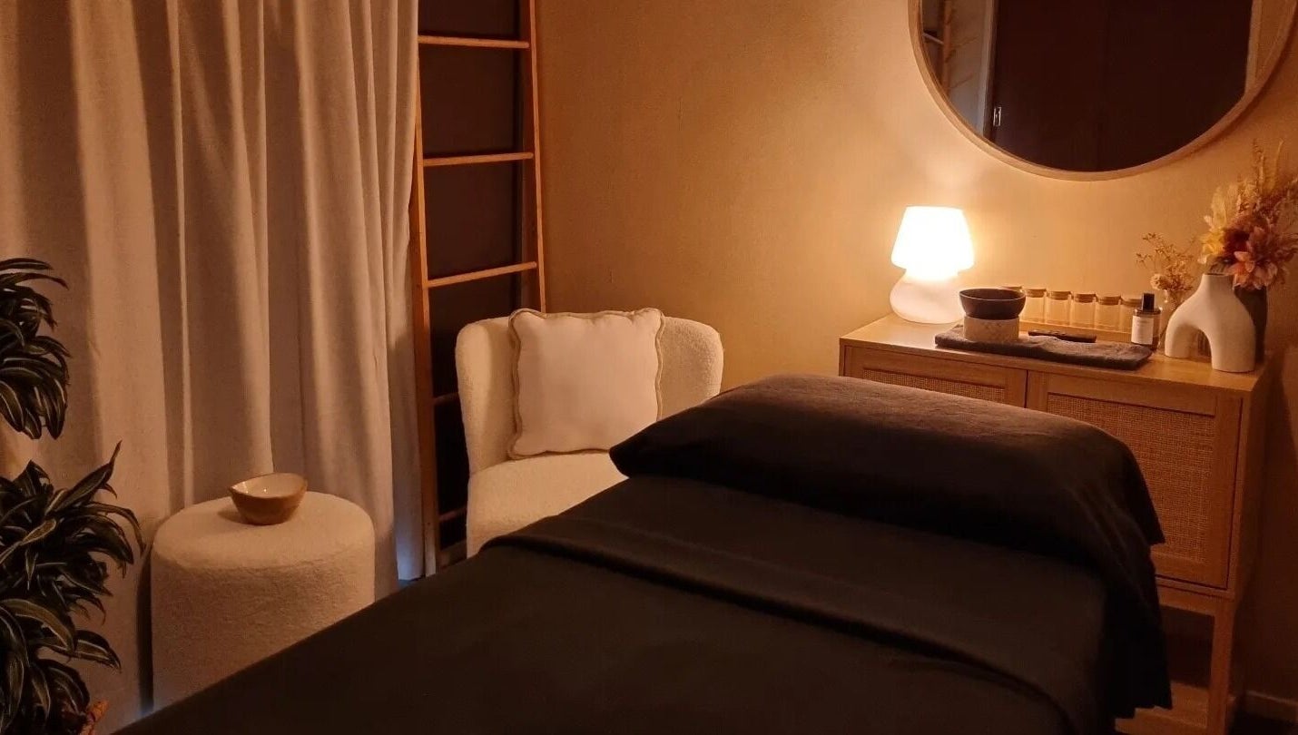 Cozy massage room with ambient lighting at Haven For Self, Hamilton, Waikato, NZ.