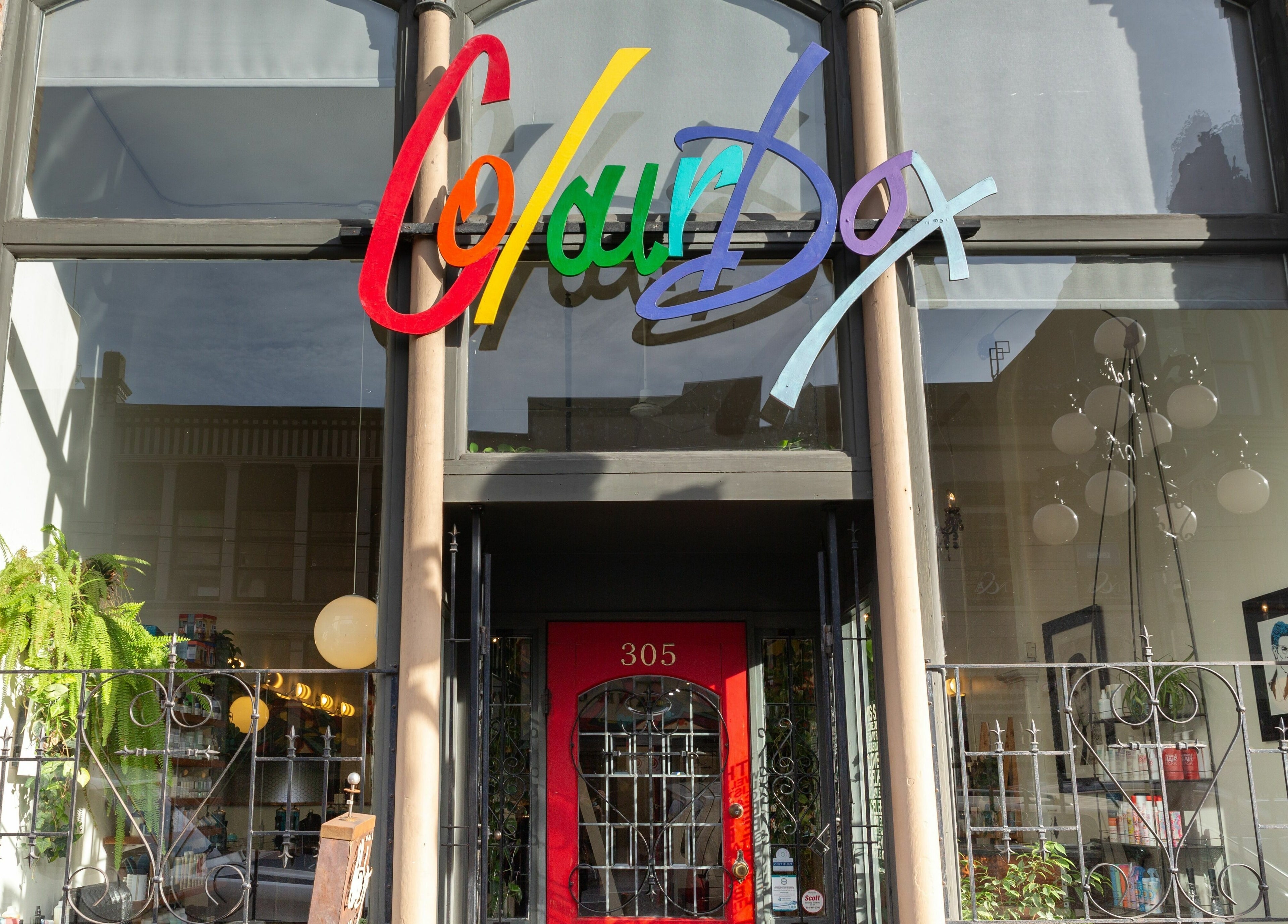 Colourbox entrance with vibrant signage, Vancouver, British Columbia, CA.