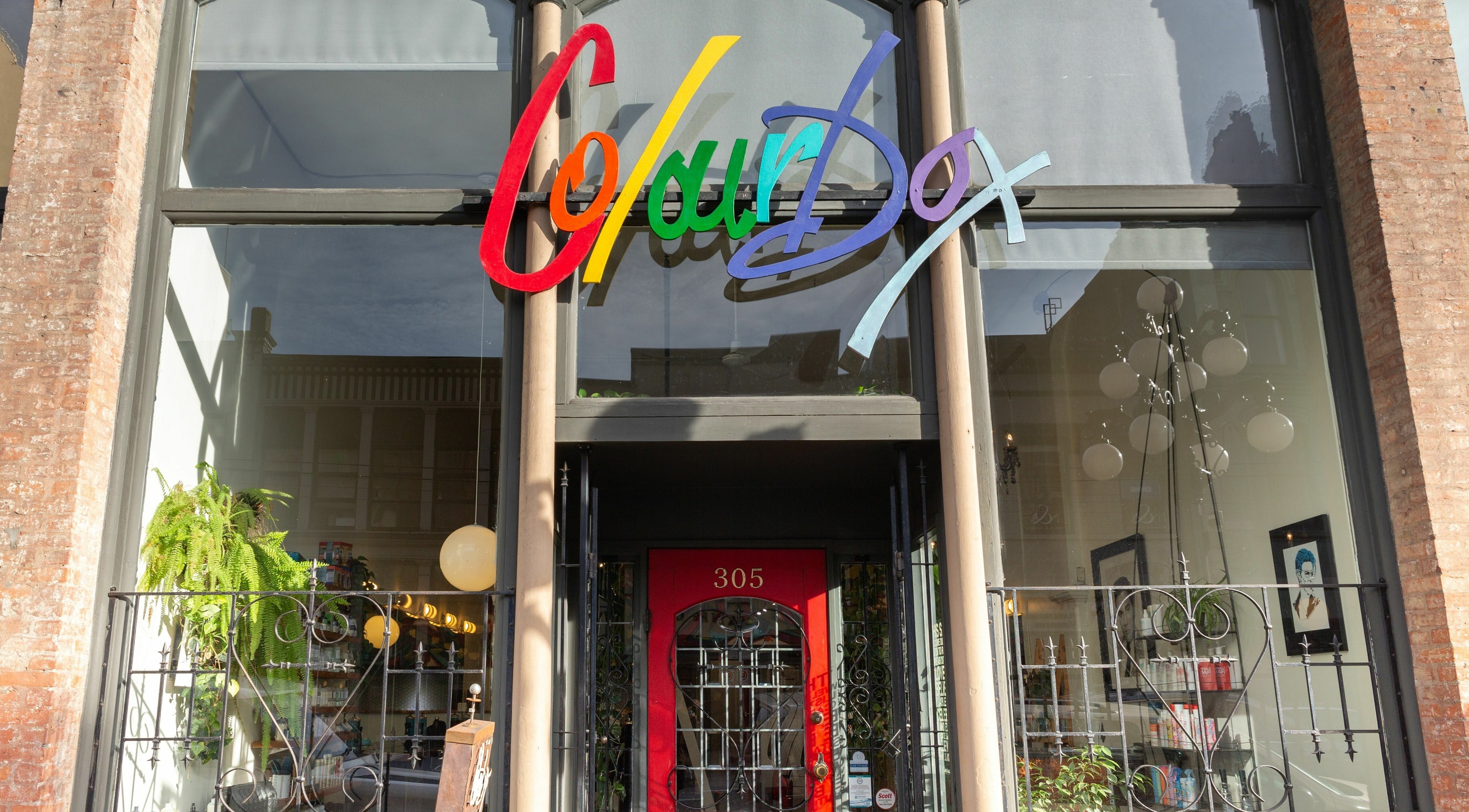 Colourbox entrance with vibrant signage, Vancouver, British Columbia, CA.