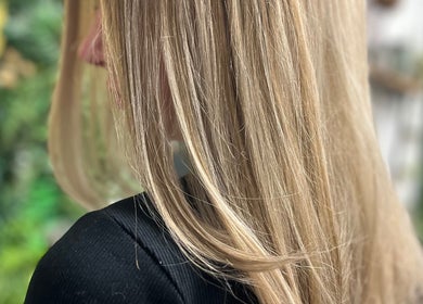 Silky blonde hair styled elegantly at Amanda Jayne Hairdressing, Swalwell, England, GB.