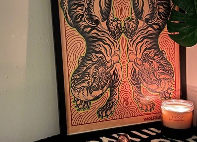 Artistic tiger print with candle decor at Tōji in Singapore, Singapore, SG for a serene ambiance.
