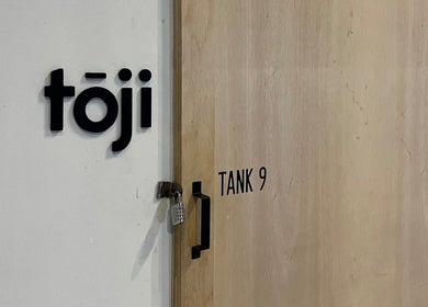 Entrance of Tōji in Singapore, Singapore, SG with a visible lock and sign.