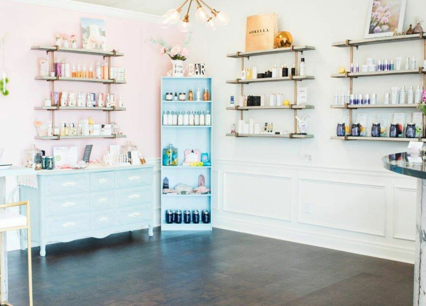 Relaxing interior of Spa Liz and Co. in Greenfield, Wisconsin, US showcasing elegant decor and beauty products.