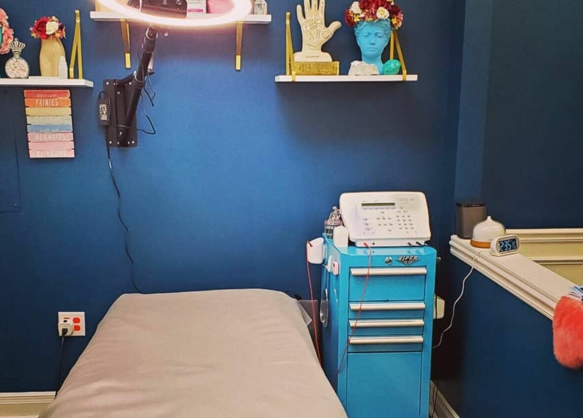 Cozy treatment room at Spa Liz and Co. in Greenfield, Wisconsin, US with soft lighting and wellness decor.