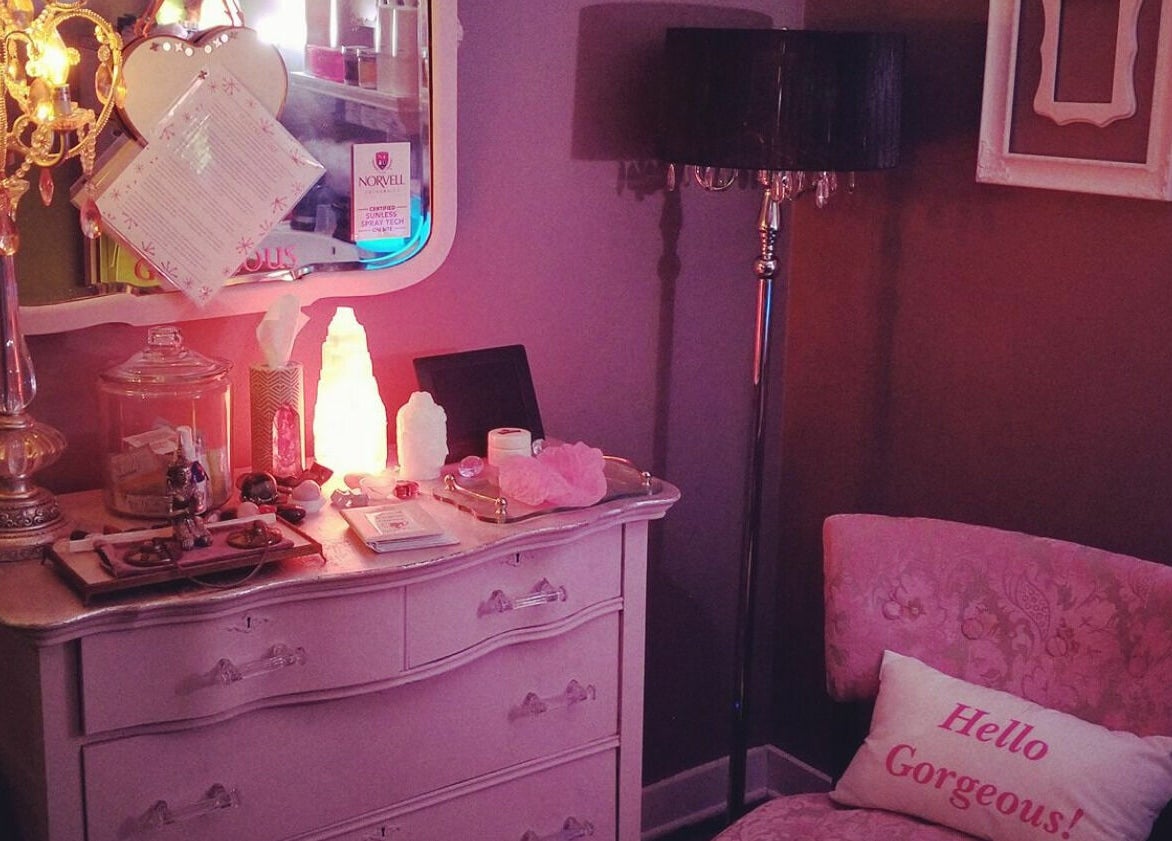 Cozy corner at Spa Liz and Co., Greenfield, Wisconsin, US, with elegant decor and warm lighting.