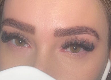 Close-up of enhanced eyelashes at Taronisbeauty, Birmingham, England, GB showcasing expert lash extensions.