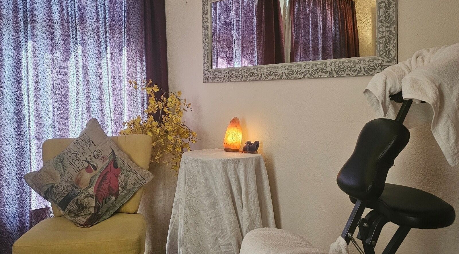 Cozy massage area at Andy Massage Therapist, Kempton Park, Gauteng, ZA with chair, pillow, and warm lighting.