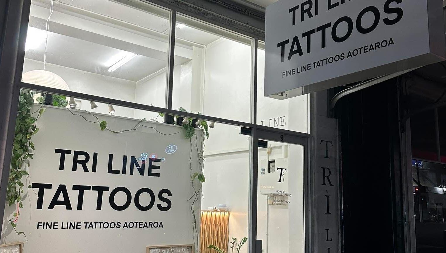 Tri Line Tattoos storefront in Auckland, NZ, showcasing a modern and welcoming exterior.