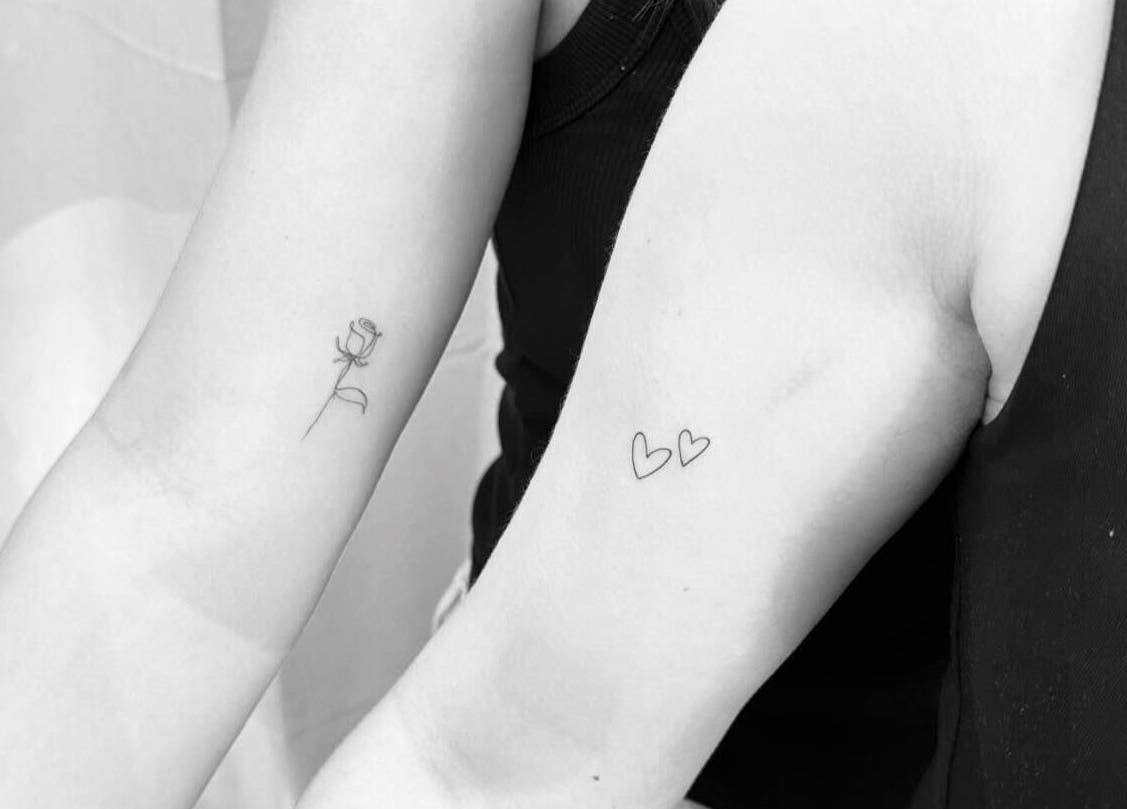 Minimalist tattoos of rose and hearts at Tri Line Tattoos, Auckland, Auckland, NZ.