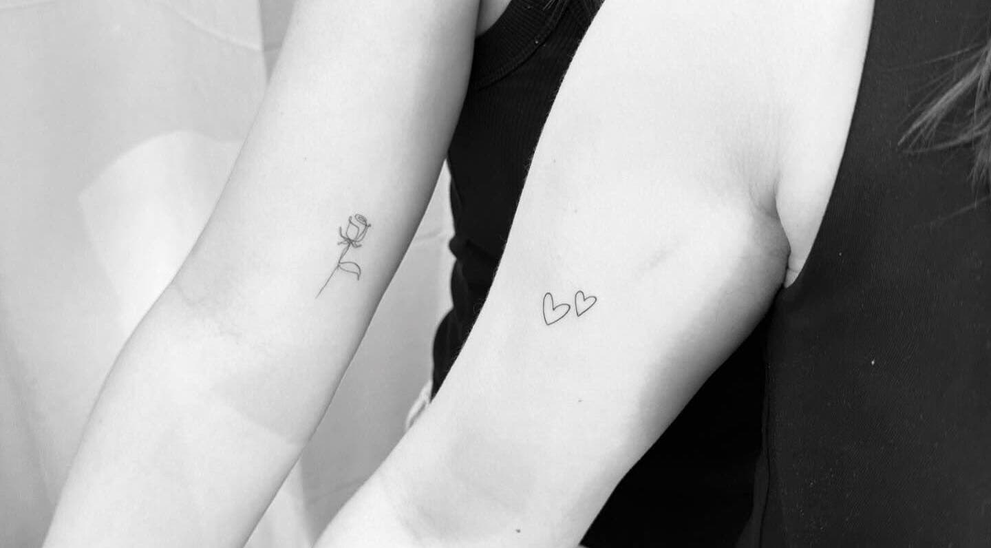 Minimalist tattoos of rose and hearts at Tri Line Tattoos, Auckland, Auckland, NZ.
