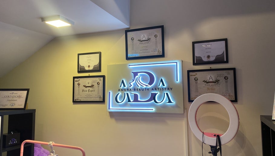 Anora Beauty Studio wall with certificates and logo in Riyadh, Riyadh Province, SA.