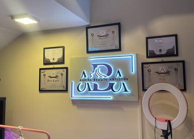 Anora Beauty Studio wall with certificates and logo in Riyadh, Riyadh Province, SA.