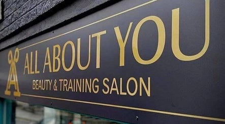 All About You salon sign with gold letters in St Austell, England, GB.