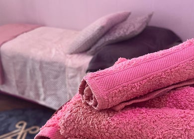 Relaxing spa bed with pink towels at All About You, St Austell, England, GB.