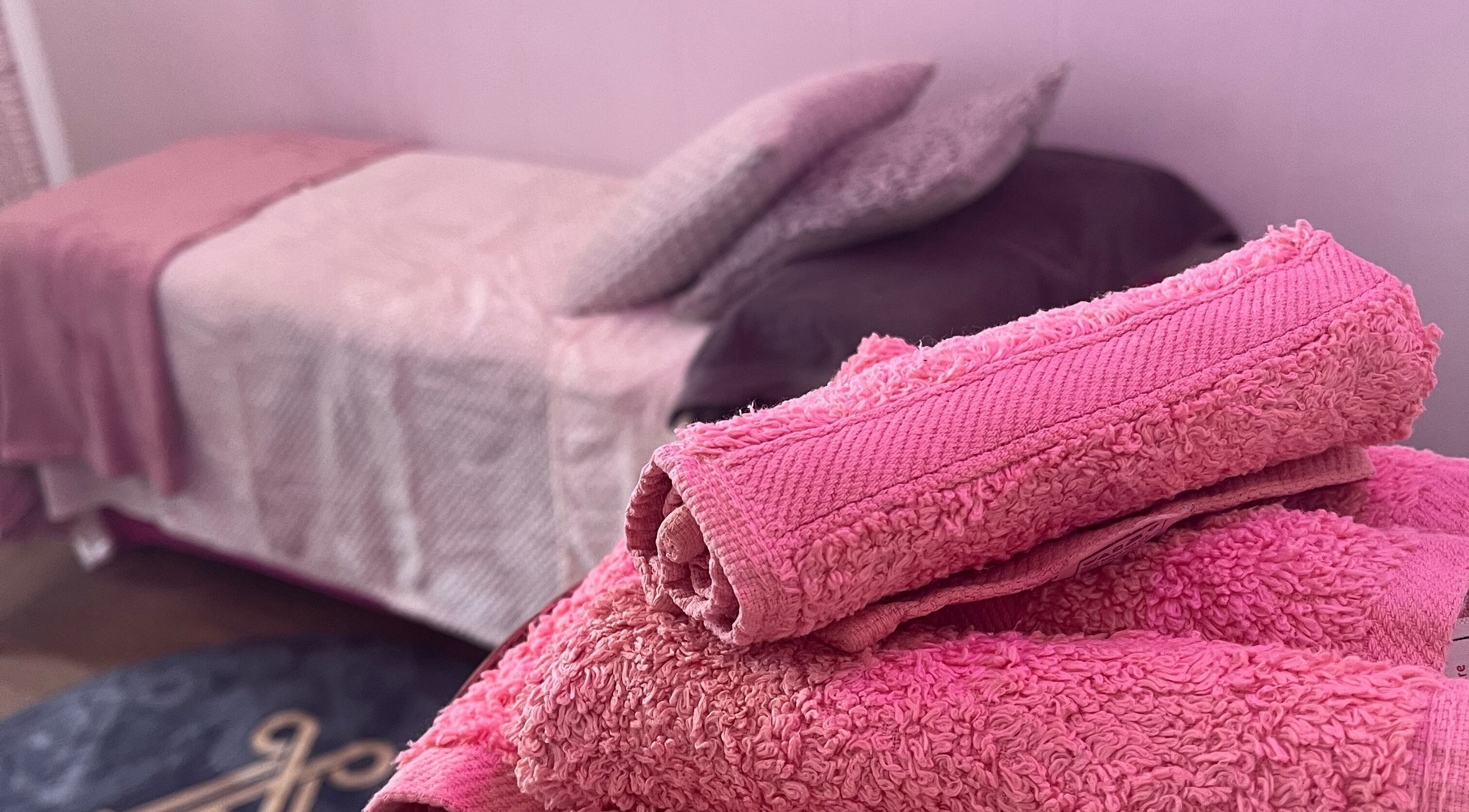 Cozy pink spa bed at All About You (Beauty salon and Training academy), St Austell, England, GB.
