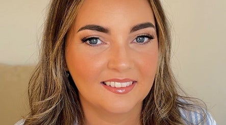 Smiling woman with flawless skin at Beauty By Becca Felton, Aberdare, Wales, GB.