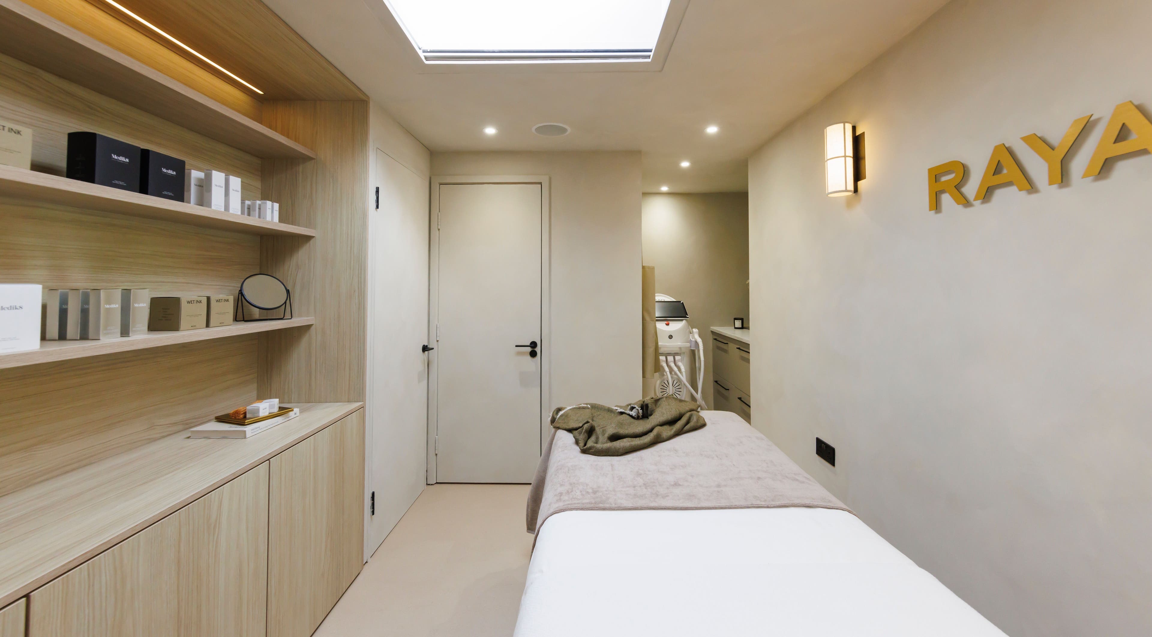 Calm and inviting treatment room at Raya Clinic - Skin, PMU & Aesthetics in Havant, England, GB.