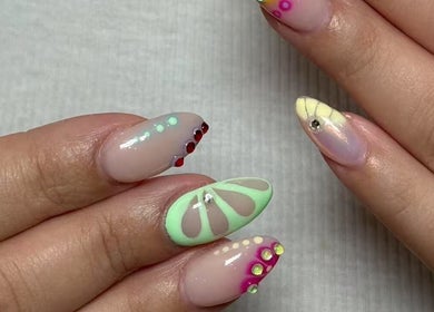 Detailed gel nail art with vibrant designs at Oasis Nail Spa Windermere in Orlando, Florida, US.