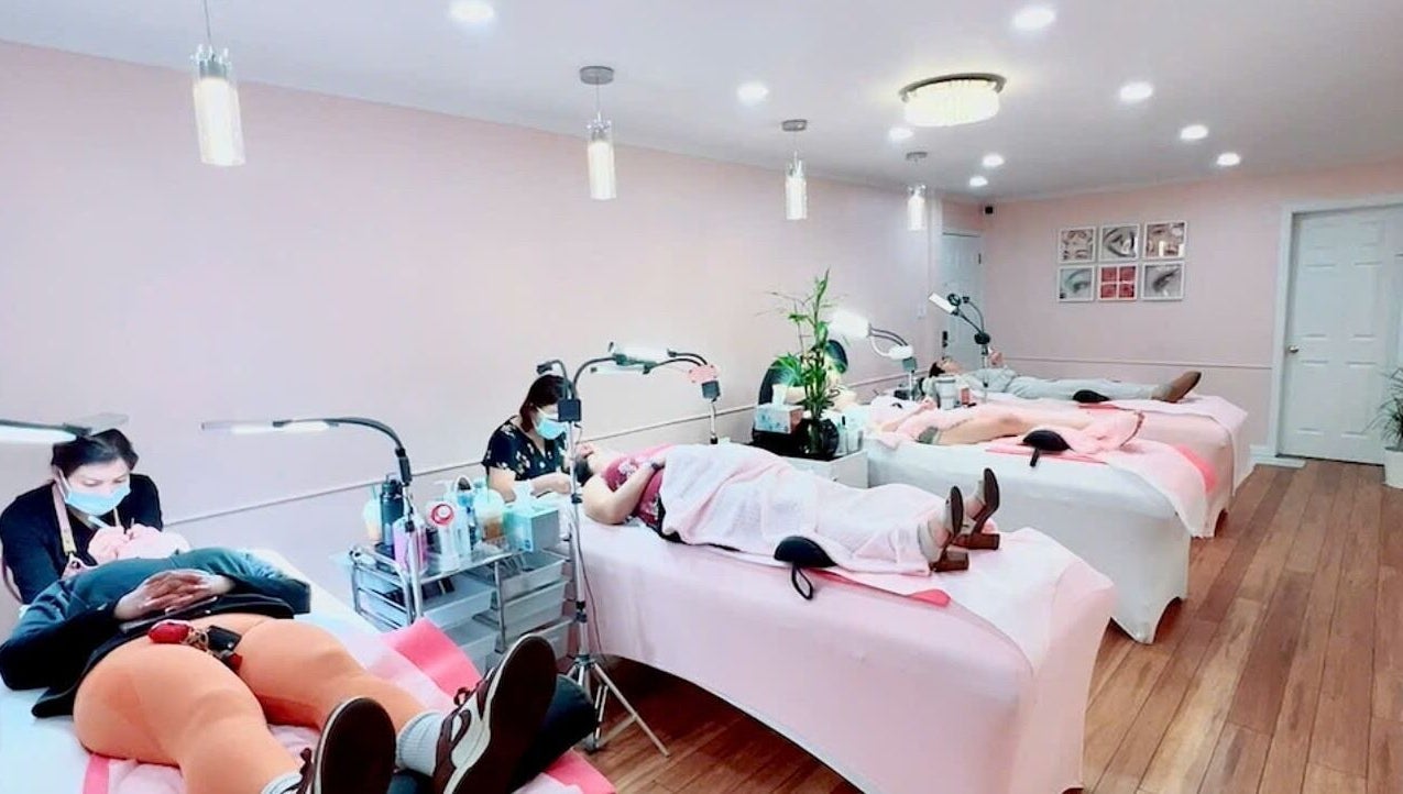 Clients relaxing at Spring Lashes and Brows in San Jose, California, US. Elegant treatment beds and serene ambiance.