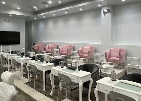 Chic interior of Luxury Nail and Brow Bar in Glendale, California, US featuring stylish manicure stations and seating.