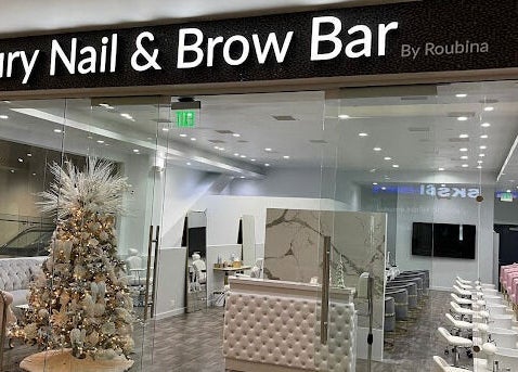 Entrance of Luxury Nail and Brow Bar in Glendale, California, US, showcasing chic interior and a festive decor.