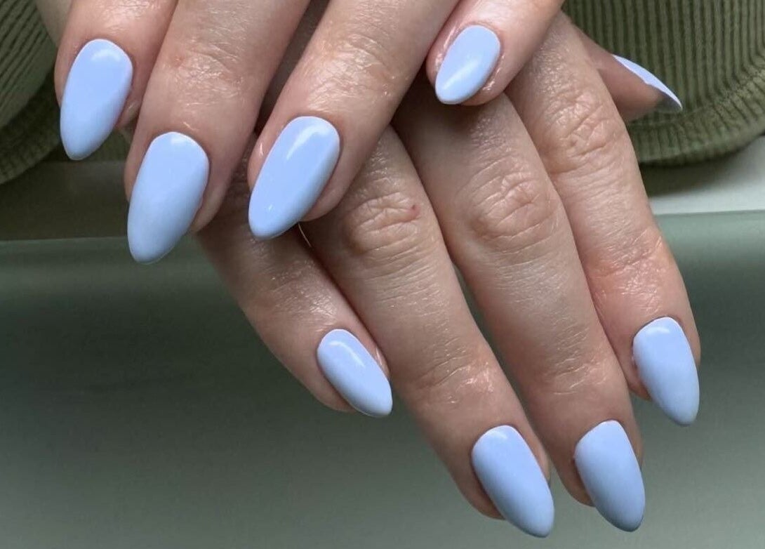 Beautiful lilac manicured nails at Luxury Nail and Brow Bar, Glendale, California, US.