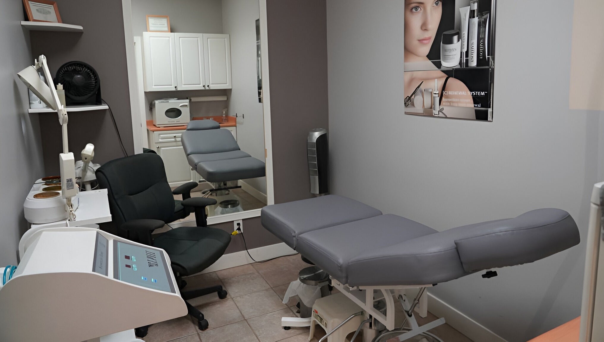 Treatment room at From Hair On in Port Moody, British Columbia, CA with massage table and modern decor.