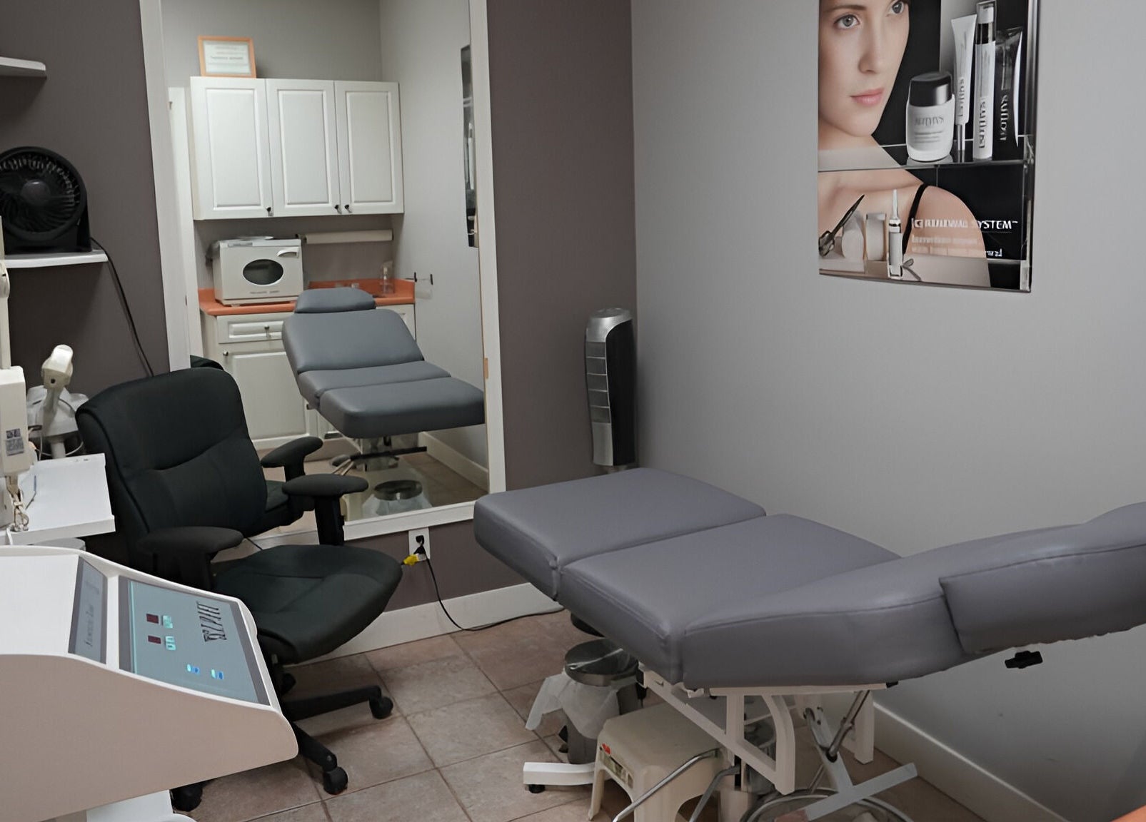 Treatment room at From Hair On in Port Moody, British Columbia, CA with massage table and modern decor.