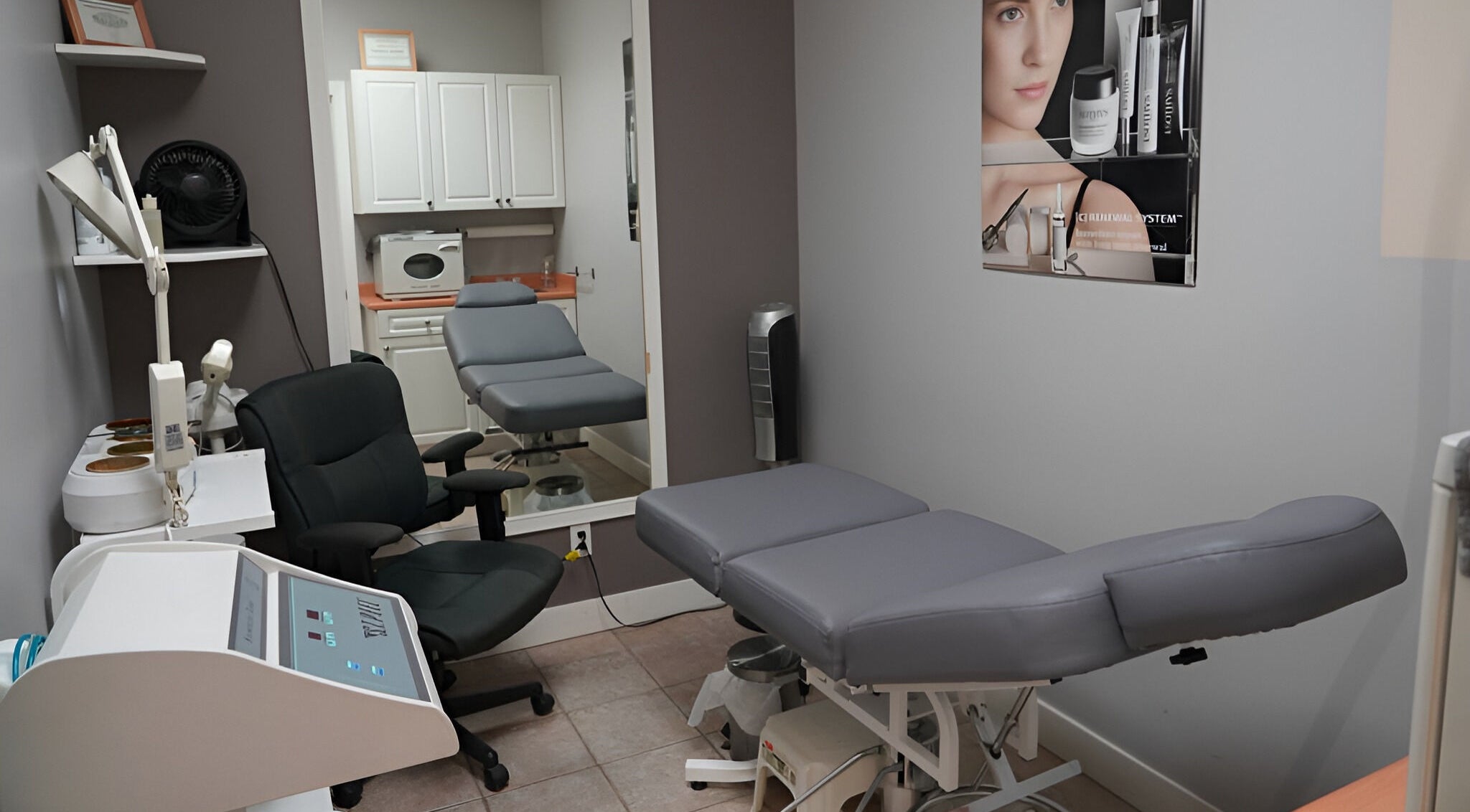 Treatment room at From Hair On in Port Moody, British Columbia, CA with massage table and modern decor.