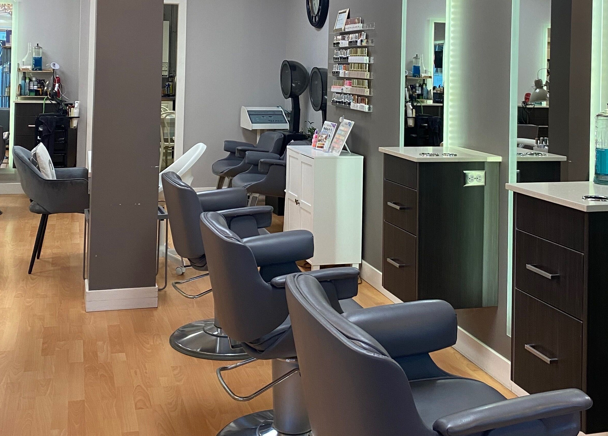 Elegant salon interior with stylish chairs at From Hair On, Port Moody, British Columbia, CA.