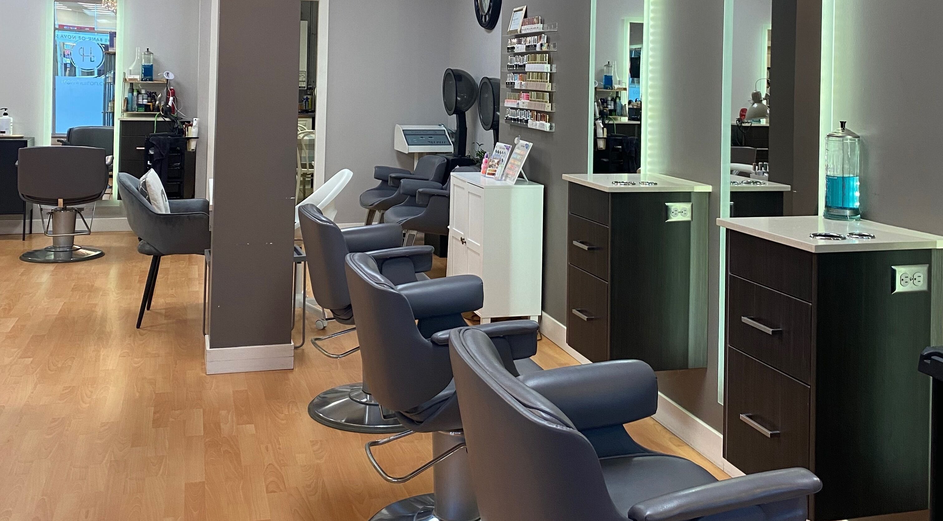 Elegant salon interior with stylish chairs at From Hair On, Port Moody, British Columbia, CA.