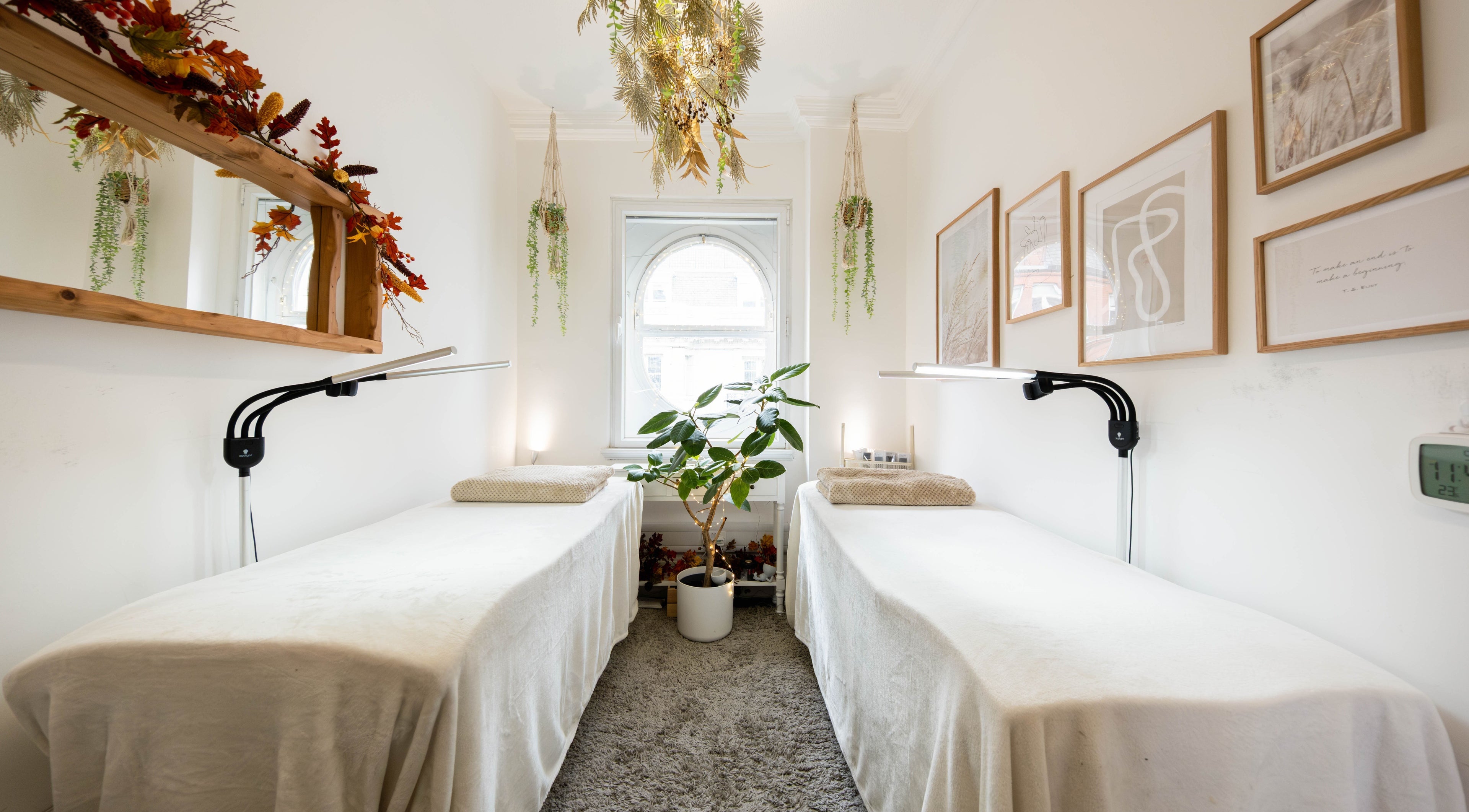 Calming treatment room at Moka Lashes in London, England, GB, adorned with plants and warm lighting.