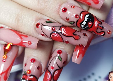 Stunning red and black nail designs at The Nail Junkie, Southampton, England, GB.