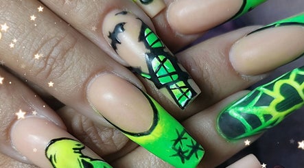 Vibrant neon nail art at The Nail Junkie, Southampton, England, GB. Stunning green and black designs.