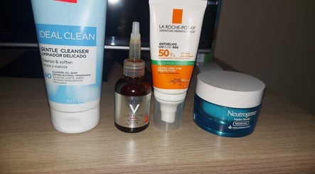 Diverse beauty products on a shelf at Dushi and Beauty, Willemstad, Curaçao, CW, showcasing skincare essentials.