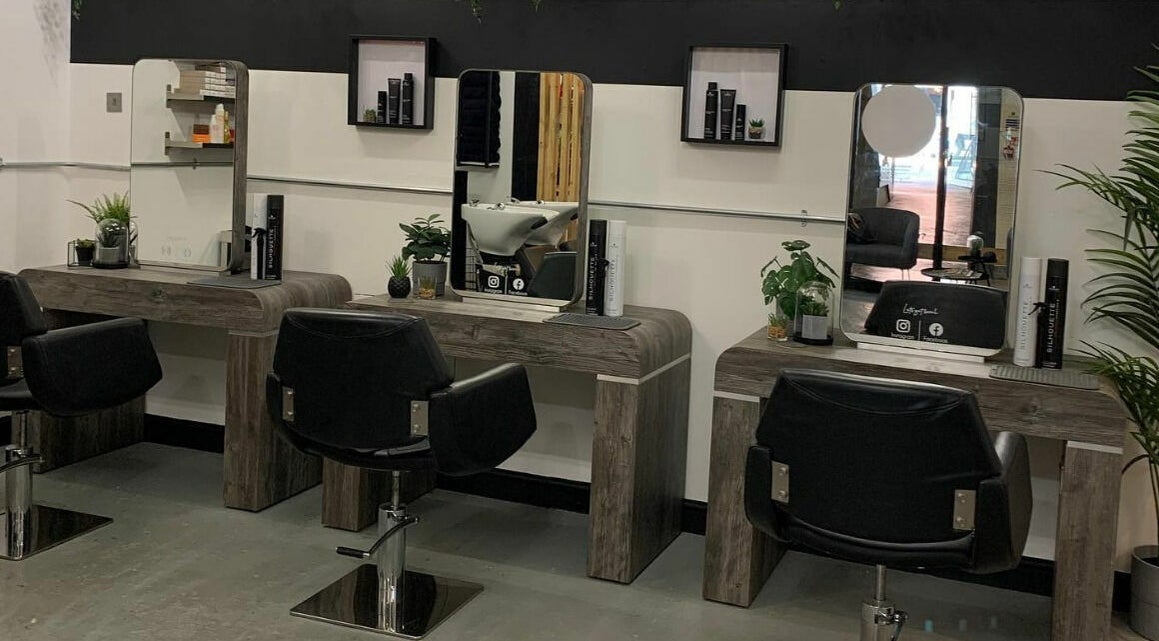 Modern salon setup at Eden, Sheffield, England, GB with sleek chairs and mirrors for beauty treatments.