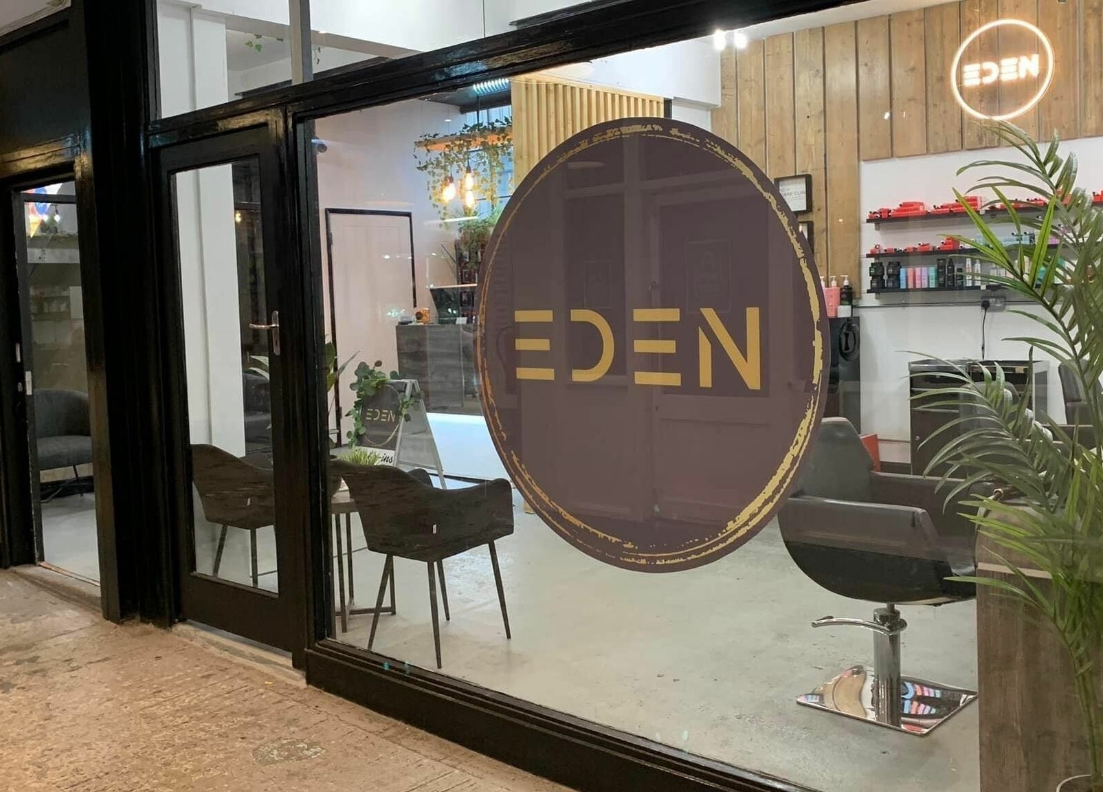 Modern entrance of Eden beauty salon in Sheffield, England, GB, featuring sleek design and inviting ambiance.