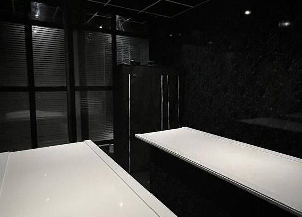 Sleek, modern treatment room at Beautifly in Romford, England, GB with minimalist design.