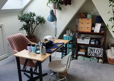 Cozy workspace in Holistic Bristol, Bristol, United Kingdom, GB adorned with plants and wellness setup.