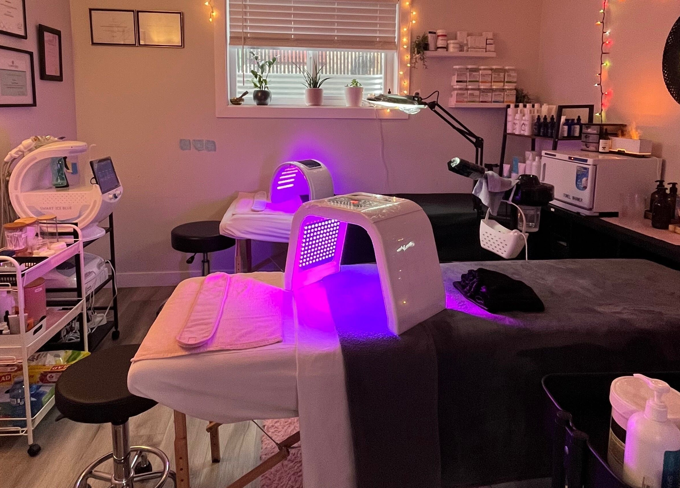 Modern treatment room with glowing light therapy at Skin4Life Beauty Bar, Calgary, Alberta, CA.