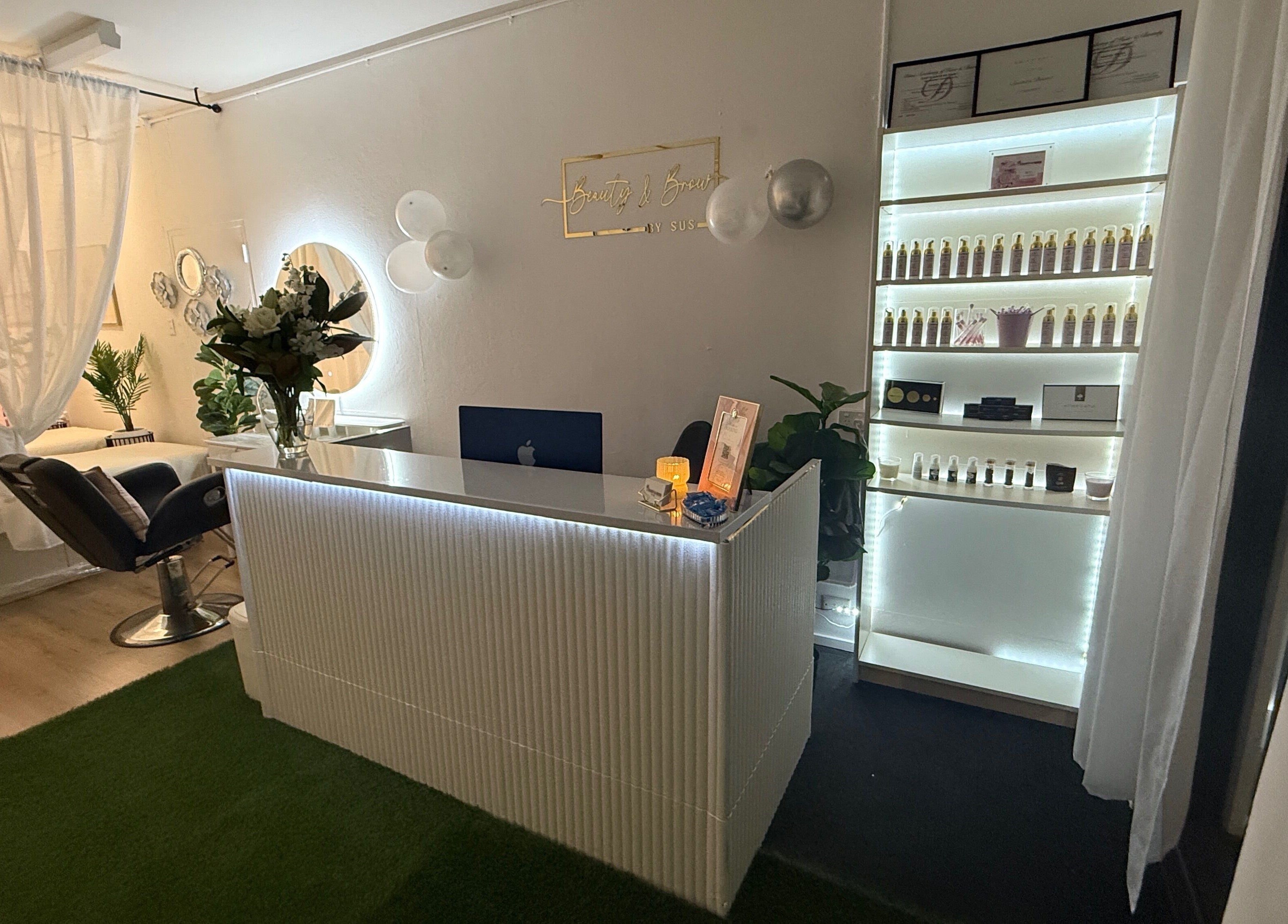 Reception at Beauty & Brow By Sus, Brookvale, New South Wales, AU with elegant decor and treatment areas.