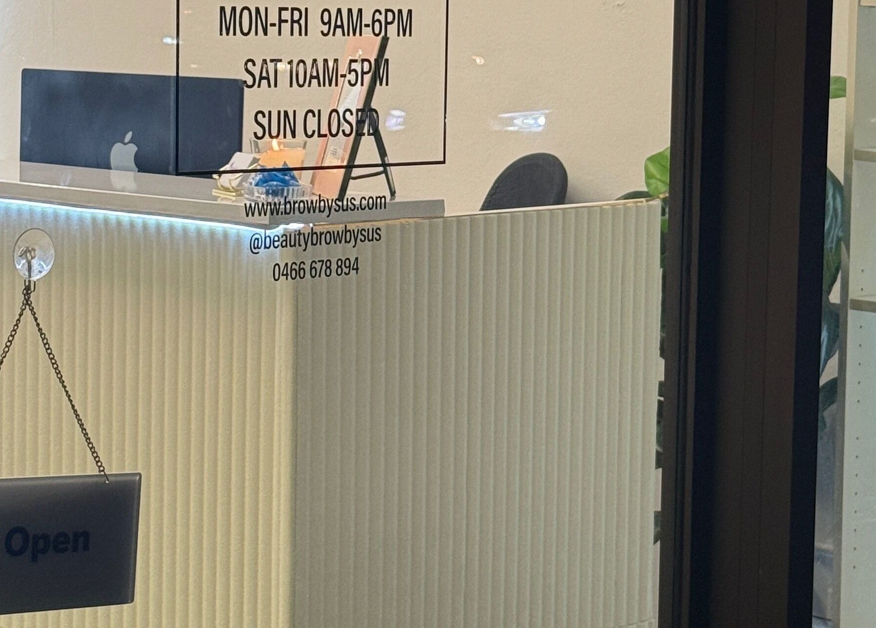 Front desk at Beauty & Brow By Sus, Brookvale, New South Wales, AU with open sign and business hours.