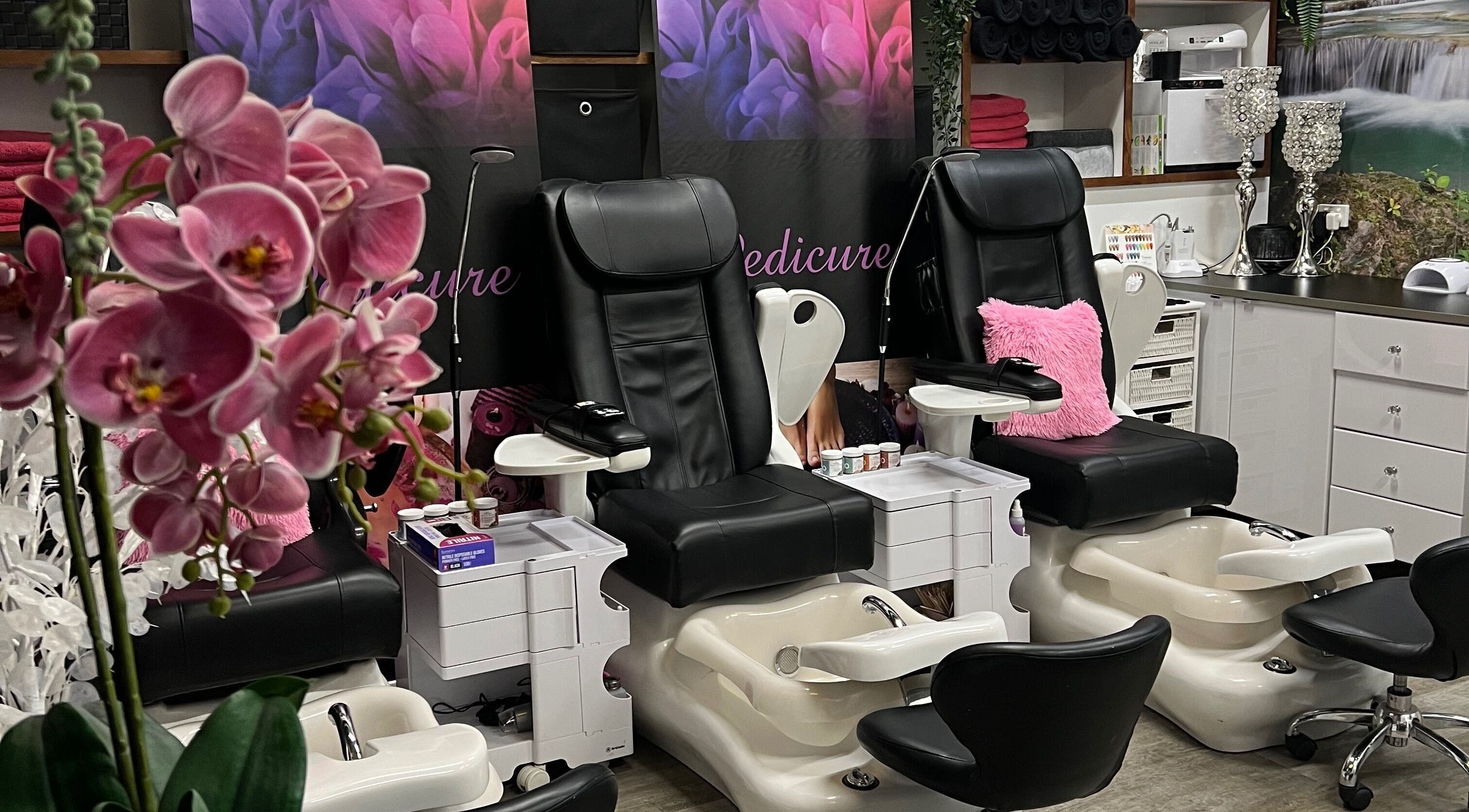 Elegant pedicure chairs at Polish'd Nail & Beauty Salon, Maffra, Victoria, AU amid vibrant decor.