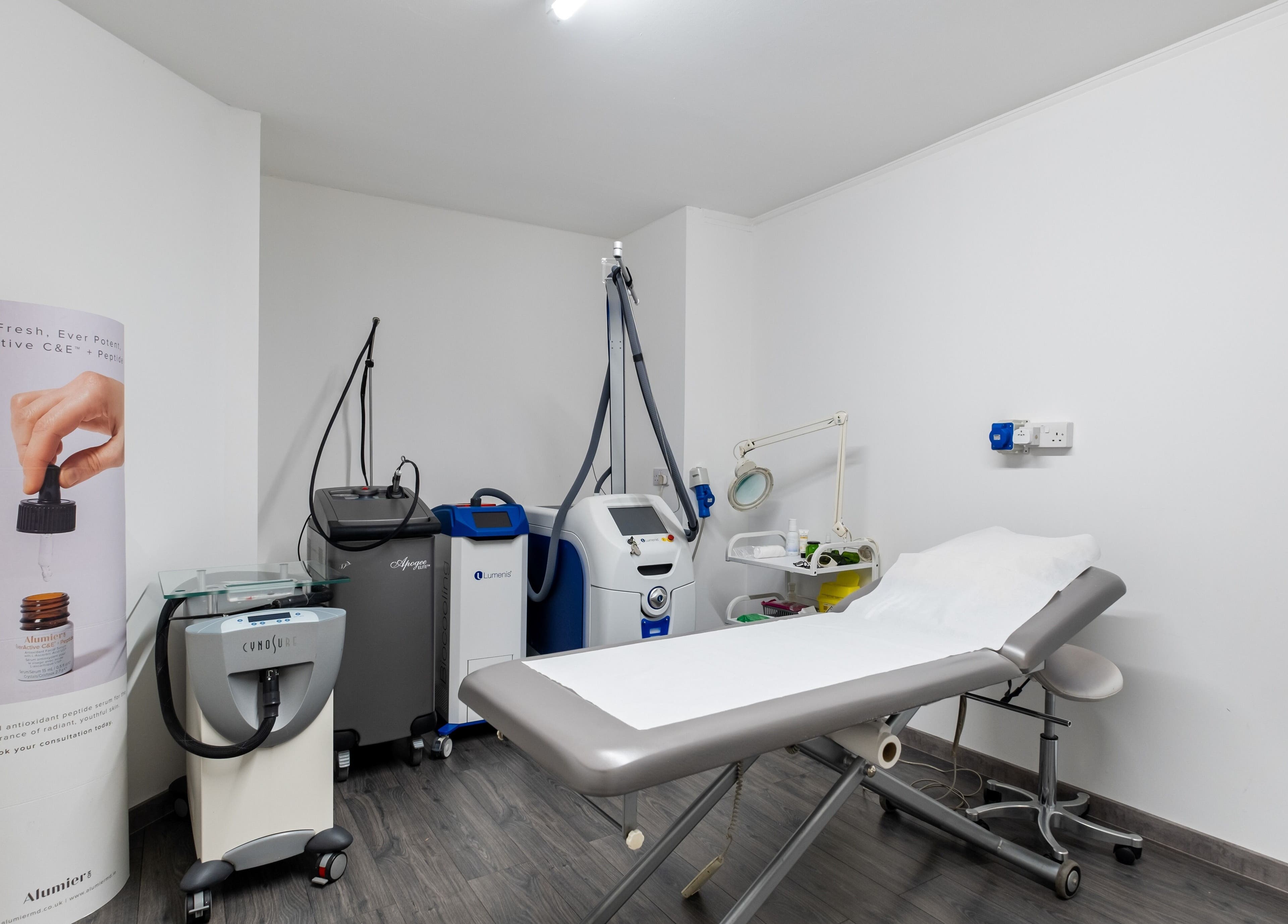 Skindeep Laser & Beauty's treatment room in Coventry, England, featuring advanced equipment for wellness services.